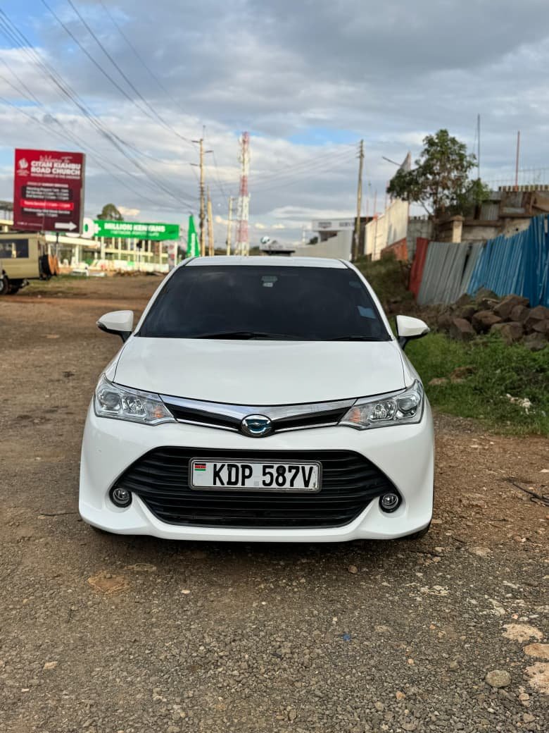 Toyota Fielder Hybrid – Pearl White | Alloy Rims | Fog Lights - Deal Motors